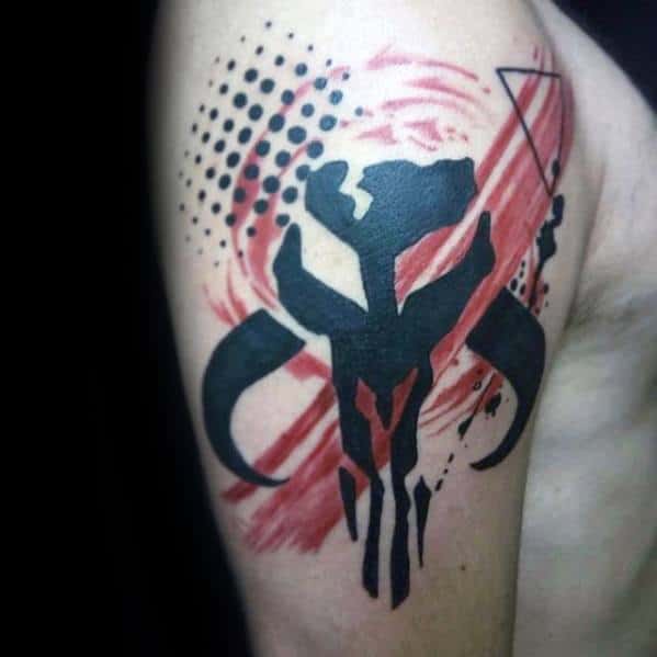 Abstract Mandalorian Mythosaur skull tattoo with red brush strokes, black dotwork, and geometric lines on the upper arm.