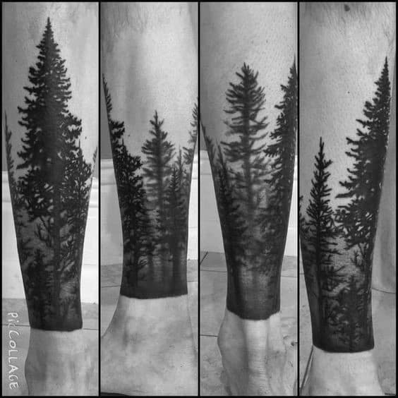 Black ink forest tattoo on the leg, featuring tall pine trees with a fading effect, creating a realistic and immersive nature-inspired design.