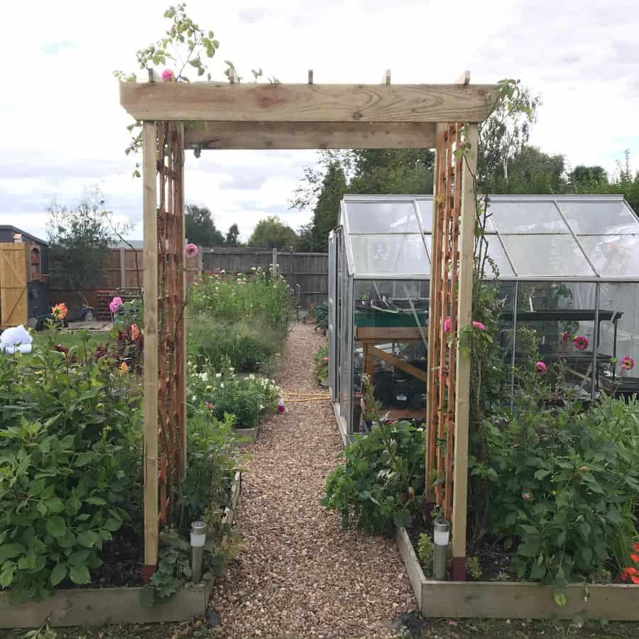 trellis vegetable garden with glasshouse