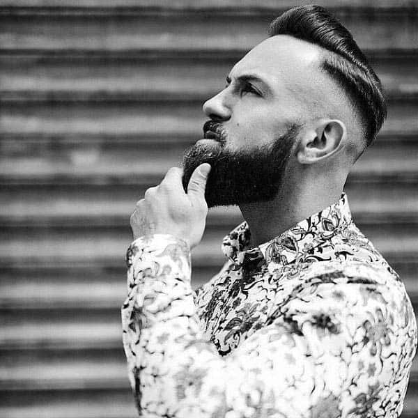 Trendy Modern Hard Part Haircut For Gentlemen With Shaved Sides