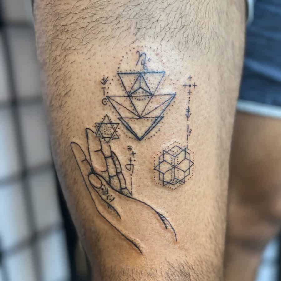 Thigh tattoo featuring a minimalist hand, geometric symbols, and sacred shapes, combining spirituality with modern line work.