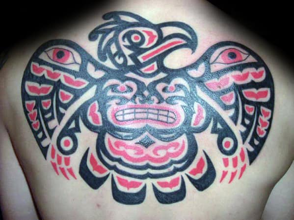 Tribal Bird Mens Upper Back Tattoo With Red And Black Design