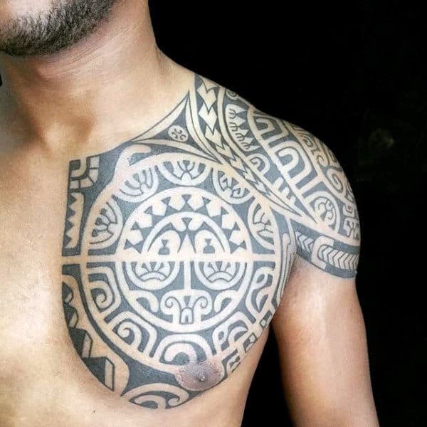 Tribal Chest And Arm Tattoos For Males