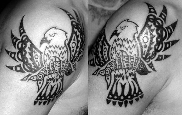 Tribal Eagle With Fish In Claws Mens Upper Arm Tattoo