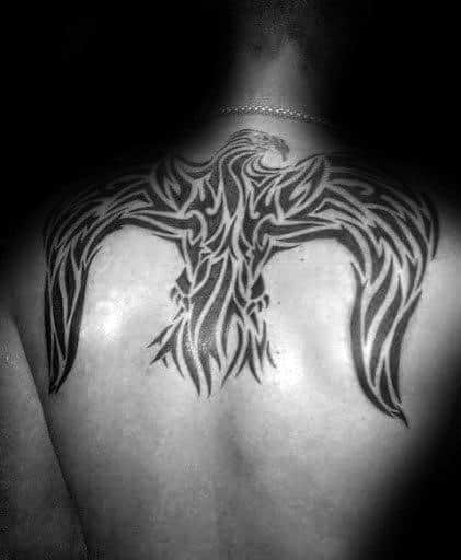 Tribal Eagle With Wings Spread Out Guys Back Tattoos