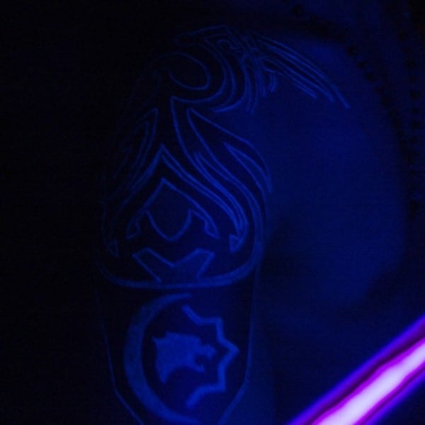 Tribal Glow In The Dark Tattoo For Men On Arm