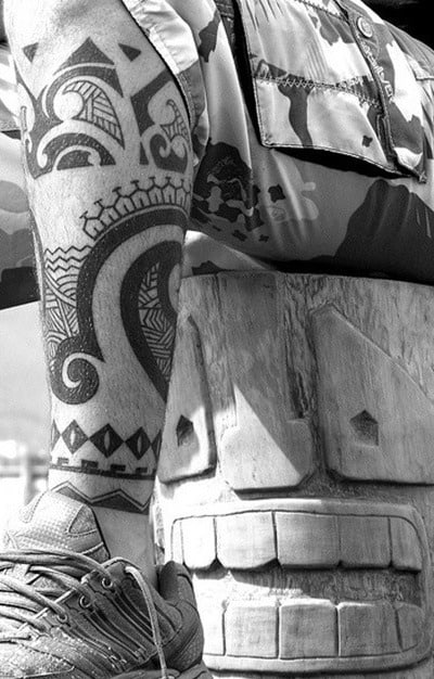 A leg with tribal tattoos