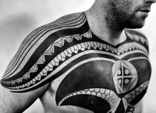 Tribal Male Arm Chest Tattoos