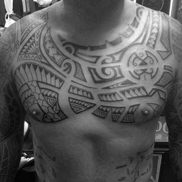 Tribal Style Male Polynesian Chest Tattoos