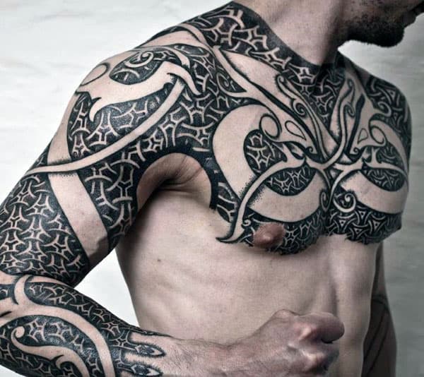 Tribal Tattoo Guys Chest And Arm