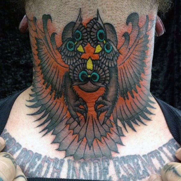 Bold throat tattoo of a stylized owl with intricate patterns, wide-spread wings, and vibrant orange, black, and teal detailing