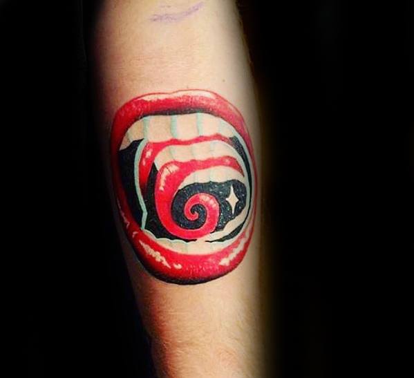 Bold tattoo of red lips with an open mouth revealing a hypnotic black and red spiral pattern inside, creating a surreal illusion.