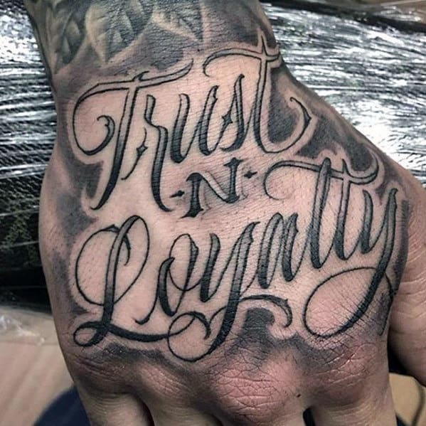 Trust And Loyalty Script Badass Mens Hand Tattoos