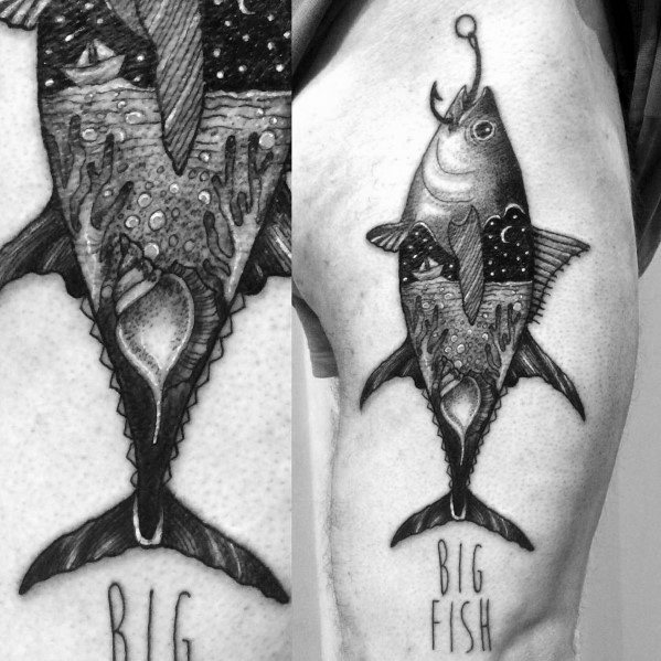 Black and grey "Big Fish" tattoo on a man's arm, featuring intricate shading, oceanic details, and a fishing hook for a bold artistic design.