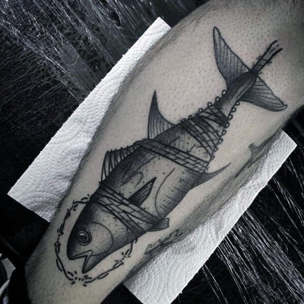 Black and grey tuna fish tattoo on a man's forearm, featuring fine line shading and a wrapped rope design for a bold and intricate nautical theme.