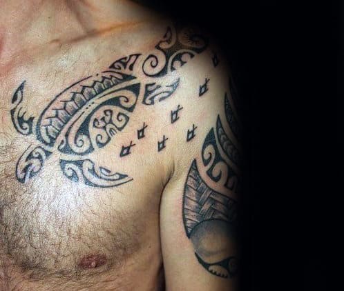 Turtle Swimming With School Of Fish Guys Tribal Upper Chest And Shoulder Tattoos