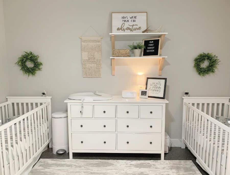country style twins nursery white cribs white dresser wall shelves