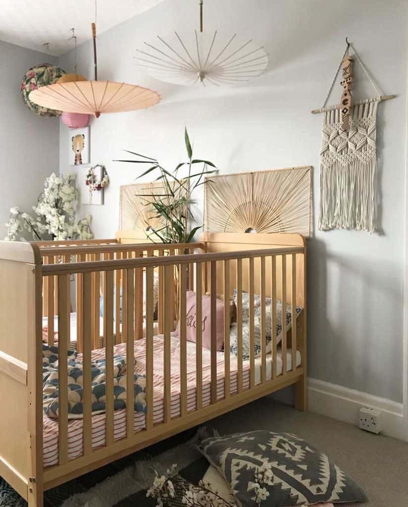 boho style twins nursery wood cribs plants
