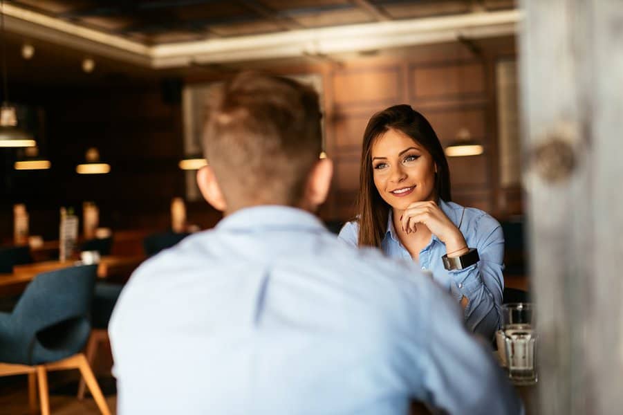two people meeting each other at the restaurant