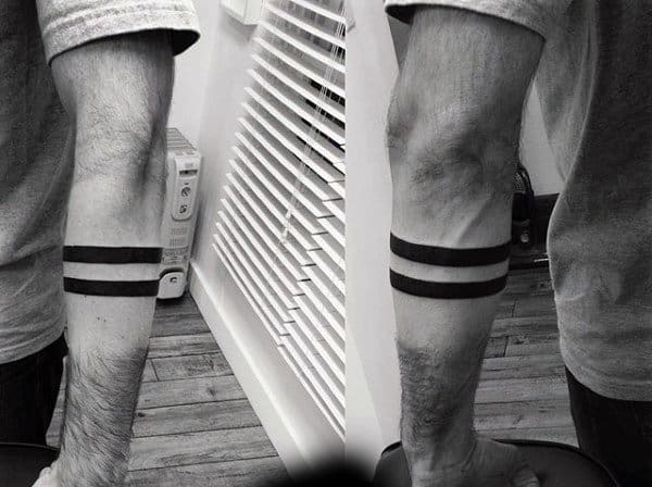 Two Solid Black Lines Armband Tattoo On Man