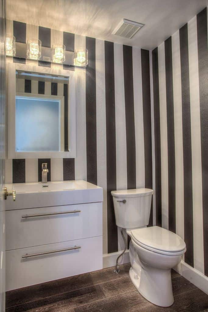 bold black and white vertical stripe wall bathroom 