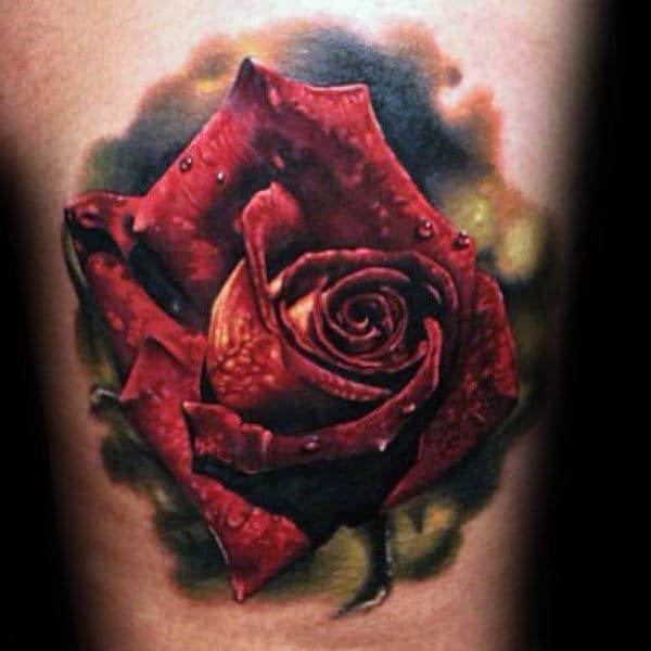 Realistic red rose tattoo with dew drops on petals