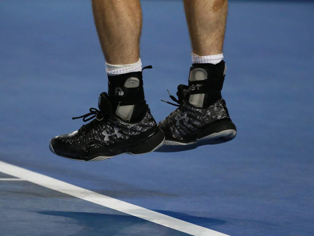 athlete jumping in Under Armour shoes