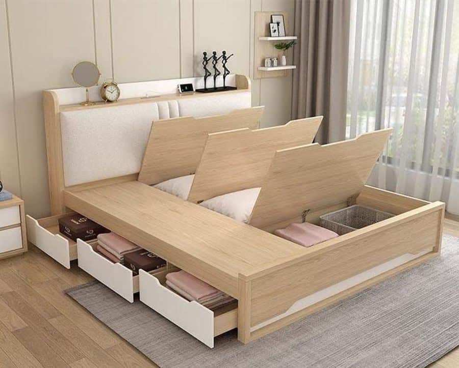 Modern wooden bed with lift-up under-bed storage and side drawers.
