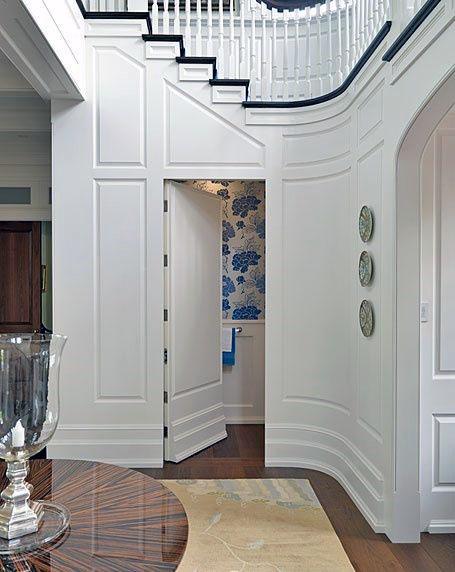 under staircase half bathroom hidden door design