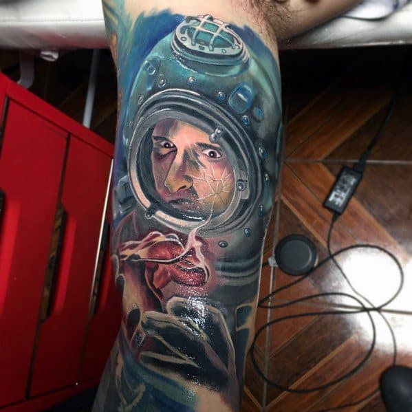 Realistic 3D tattoo of an astronaut holding an anatomical heart with a floating leaf, blending space exploration and human emotion in a vivid design.