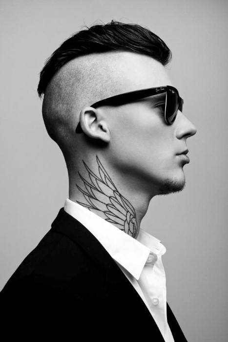Undercut Slicked Back Haircut For Men With Thick Hair