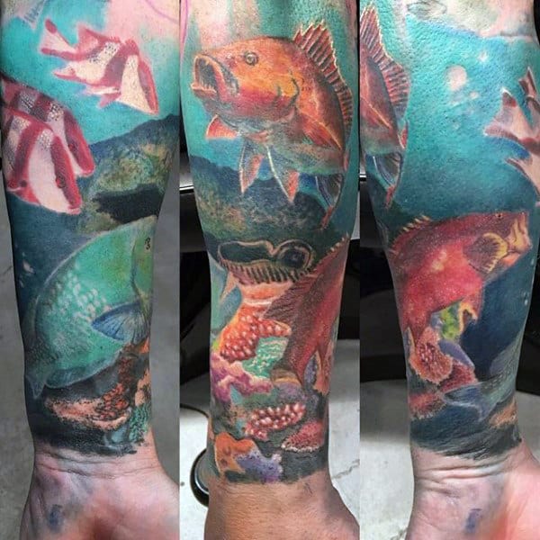 Underwater Tropical Fish Swimming Tattoo On Wrist For Men