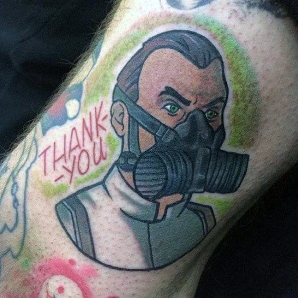 Bold Krieger tattoo featuring the scientist in a gas mask with piercing green eyes, a 'THANK YOU' text, and a glowing green background.