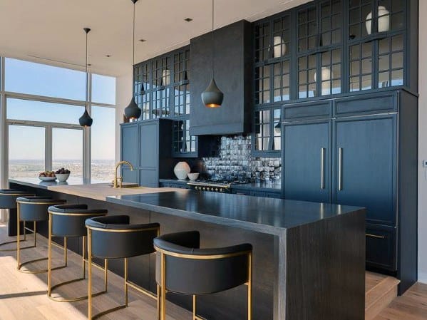 luxury black modern kitchen with gold accents five seats under kitchen bench