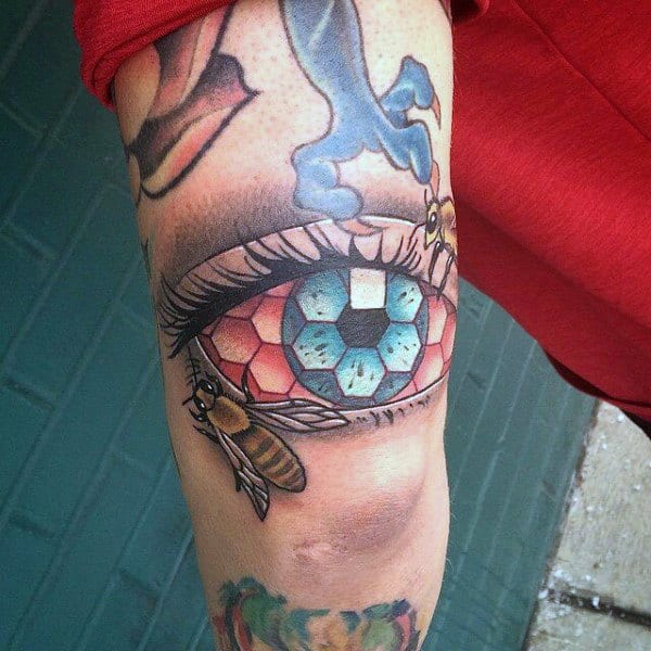 Unique Blue Eyes With Hexagonal Shapes And Honey Bee Tattoo Male Forearms