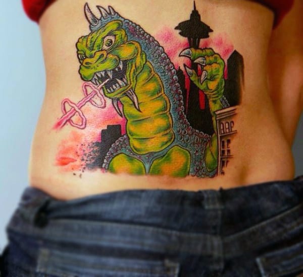 Unique Cartoon Style Seattle Tattoo Of Godziilla On Guy