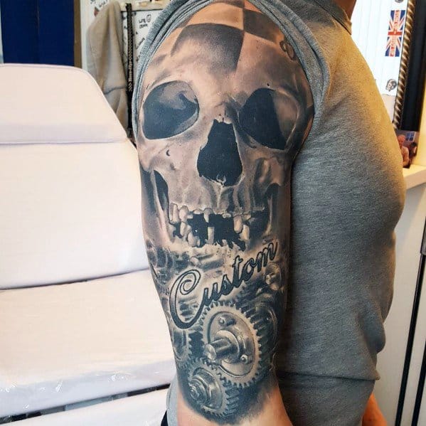 Realistic tattoo sleeve featuring a skull, mechanical gears, and the word "Custom," symbolizing individuality, engineering, and a passion for craftsmanship.