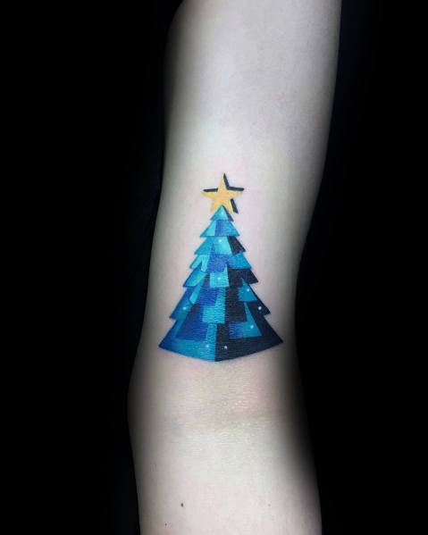 Modern geometric Christmas tree tattoo in shades of blue with a pixelated design, topped with a golden star for a sleek and artistic look.