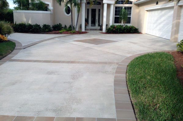 concrete driveway with tile border