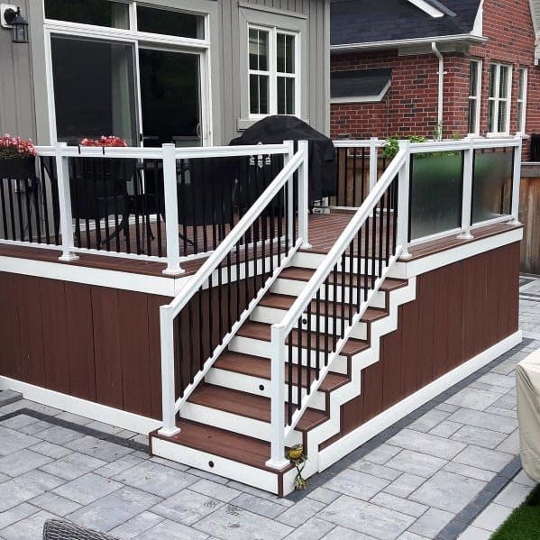wood deck white railing with glass panels and blackvbalusters