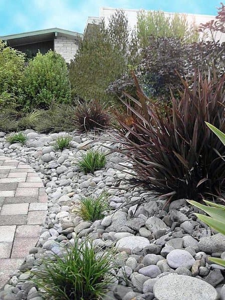 unique desert landscape design with river rock stones
