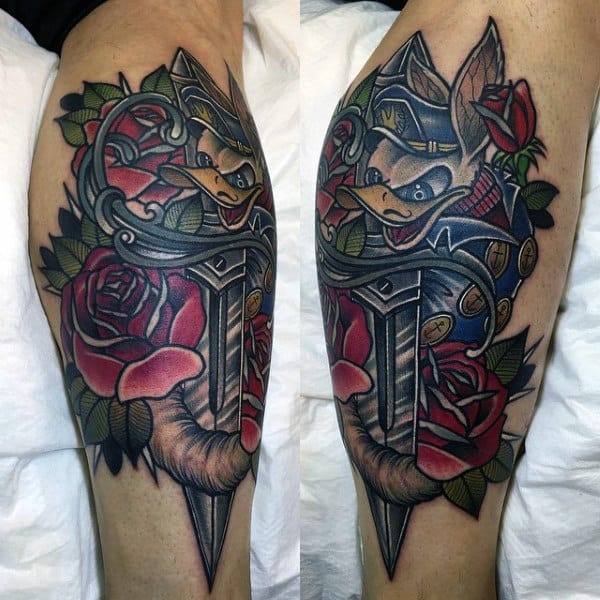 Unique Detailed Duck And Knife With Roses Tattoo On Male