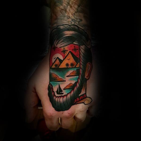 Unique Hand Face With Egyptian Pyramids Mens Tattoo Designs