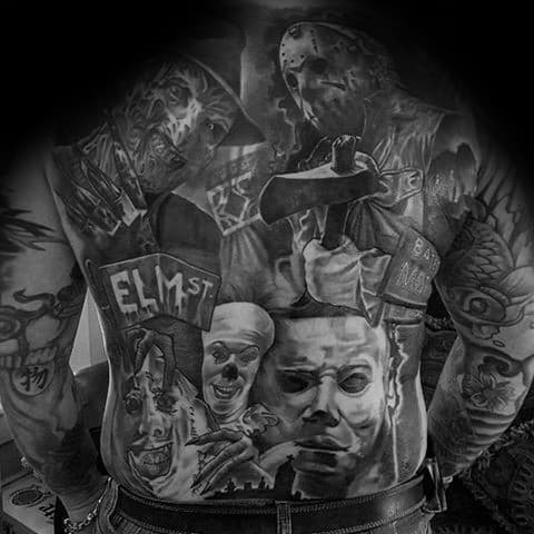 Black and grey full back tattoo featuring horror icons Freddy Krueger, Jason Voorhees, Michael Myers, Pennywise, and Elm Street elements for a chilling design.