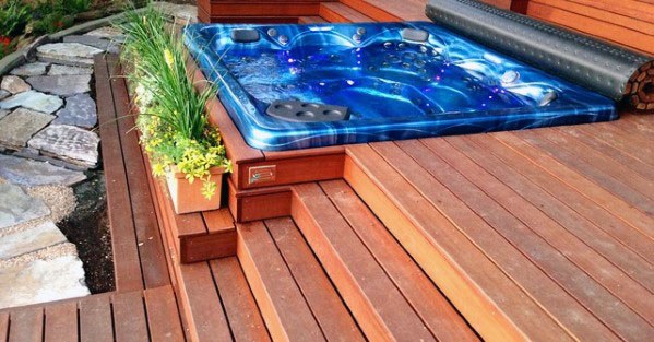 unique hot tub wood deck flower bed