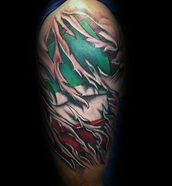 Upper arm tattoo with a torn skin effect revealing the Italian flag beneath, symbolizing strength, resilience, and deep cultural pride.