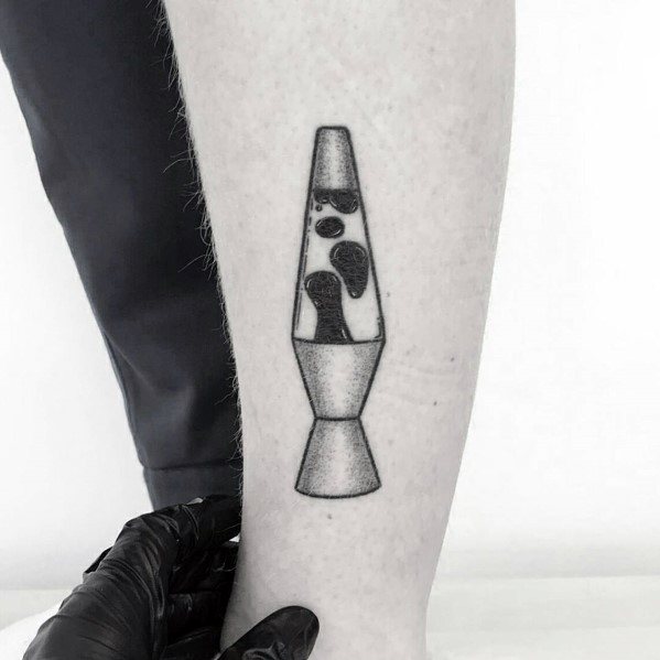 Minimalist black-and-white lava lamp tattoo with clean shading, perfect for subtle men's tattoo inspiration.