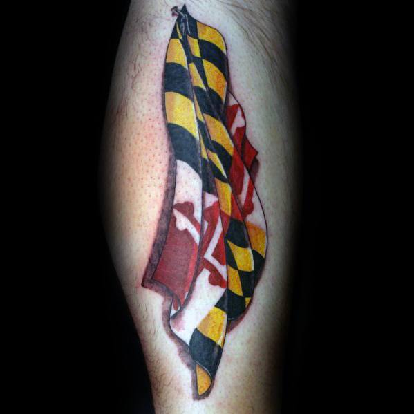 Maryland flag tattoo on the calf with a waving effect, creating a realistic look with bold colors and intricate shading.