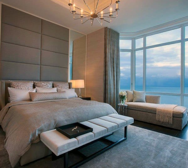 hotel style master bedroom with ocean view