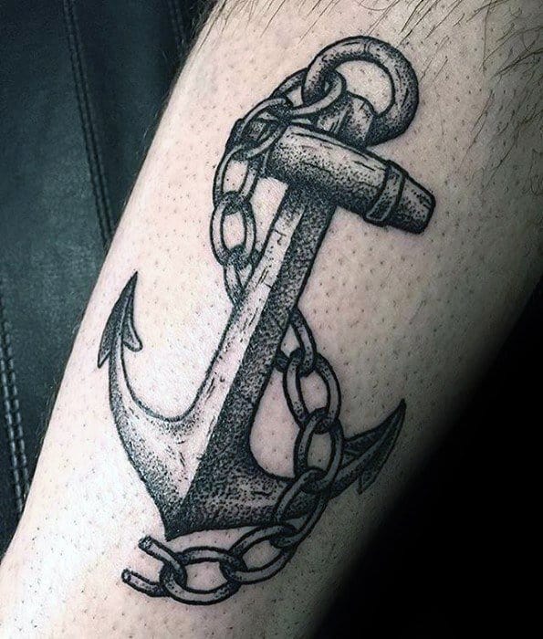 Tattoo of an anchor with chain wrapped around it